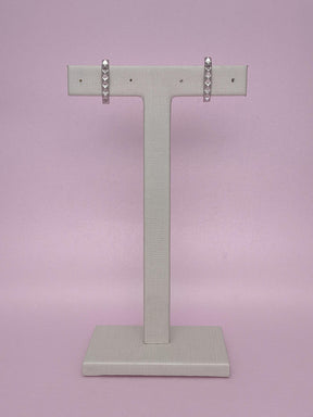 Ear Hook Linear Triângulos: sofisticação geométrica para um visual marcante