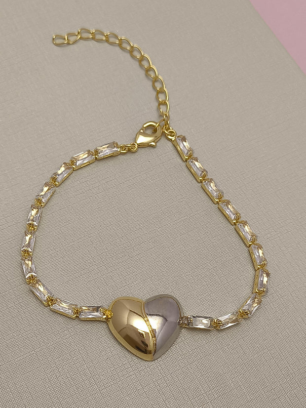 Pulseira com Baguetes e Coração Due Colori: brilho e romantismo em uma peça que une delicadeza e contraste elegante